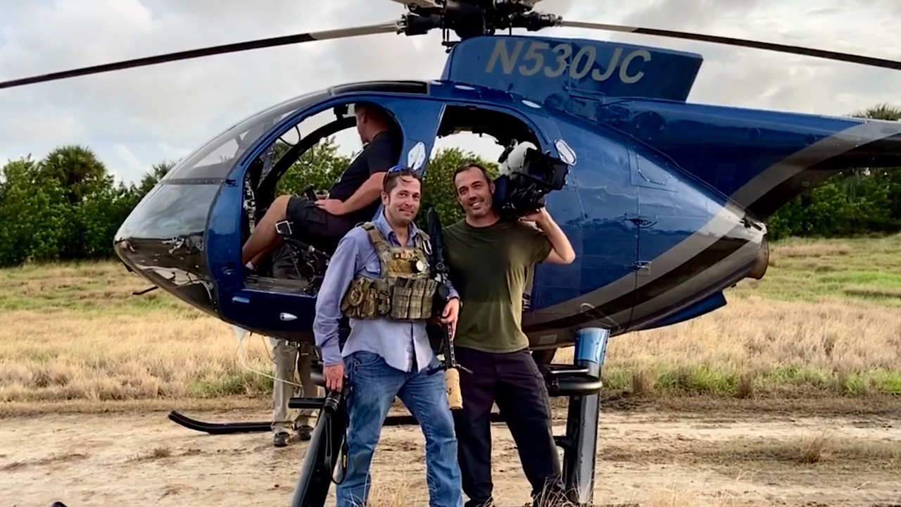 Aerial helicopter cinematography crew filming a Central Florida event
